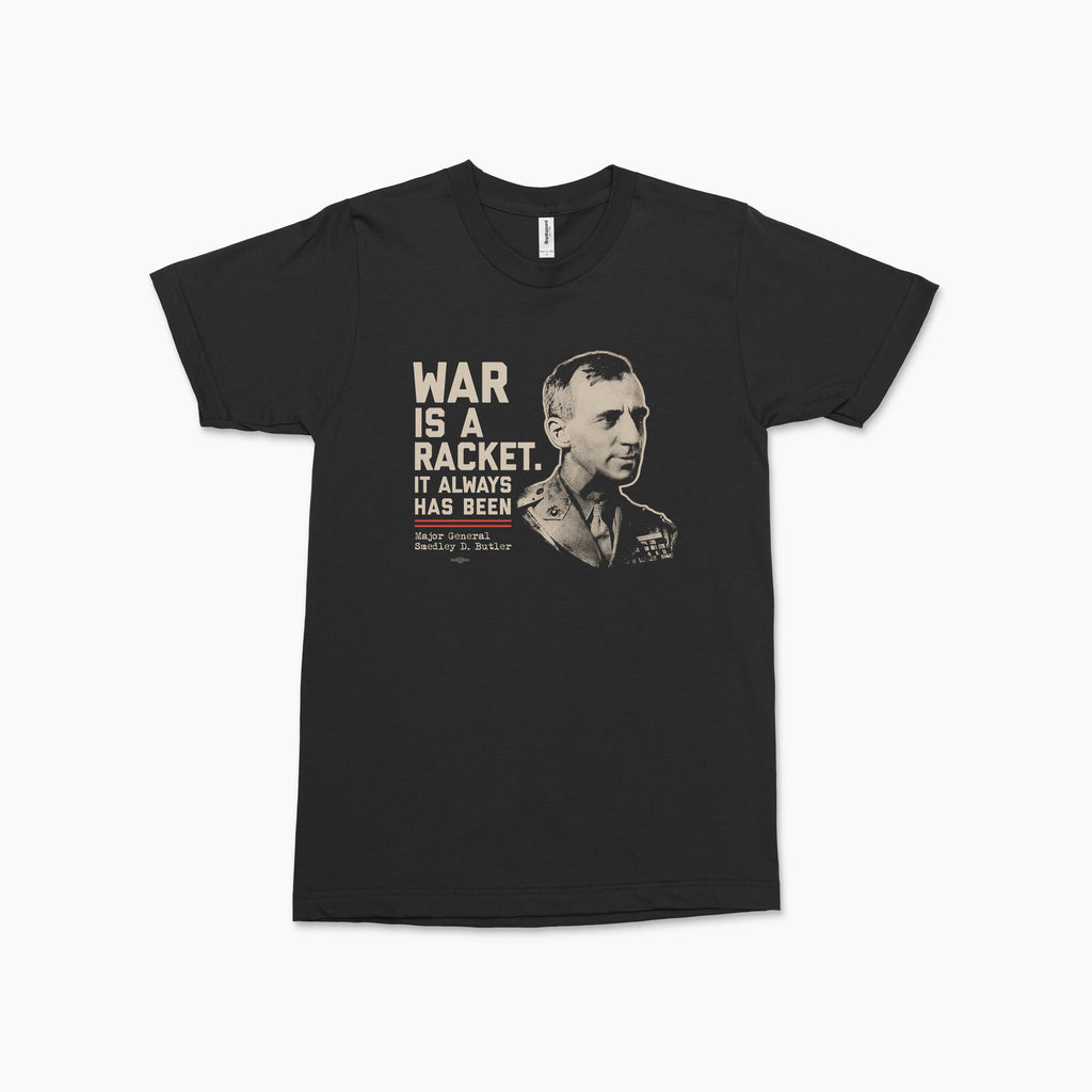 Black crew neck tee with beige text "War is a racket. It always has been." and a vintage portrait of USMC Major General Smedley Butler on the front.
